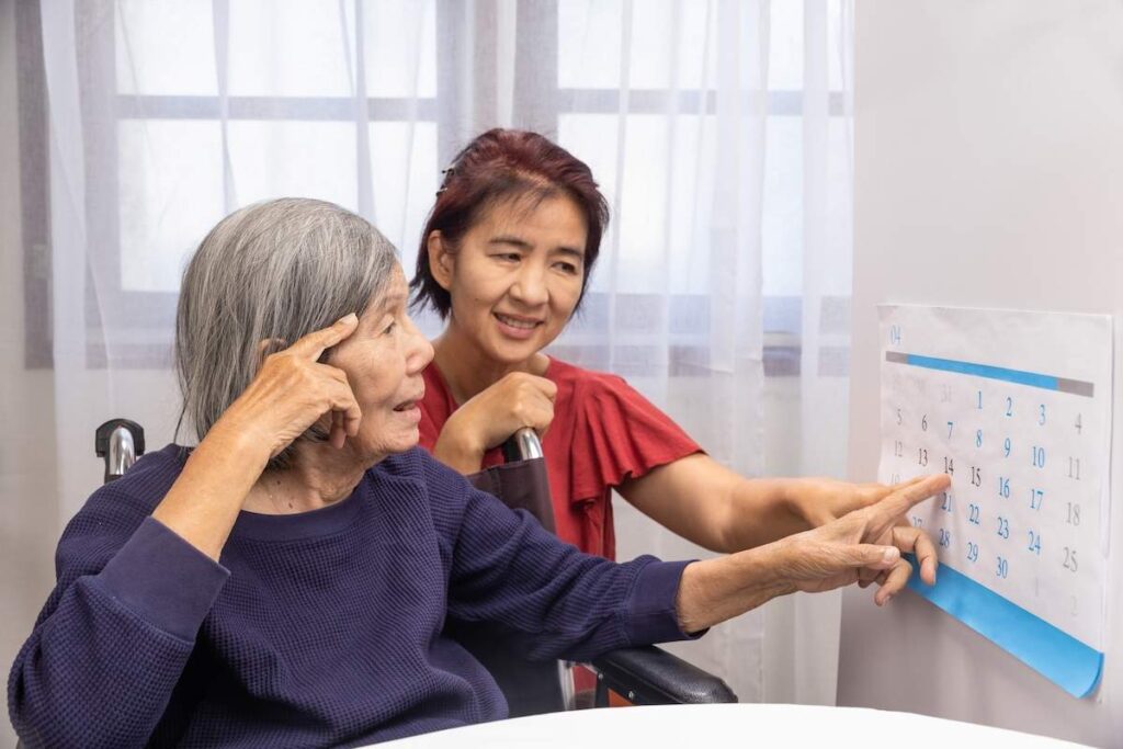 Older Woman Reading a Reading Calendar