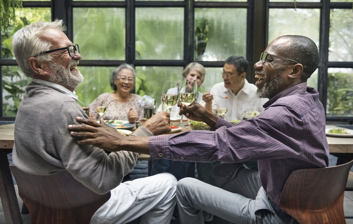 Seniors Dining and enjoying wine