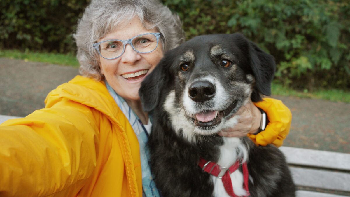 senior enjoys time with her pet