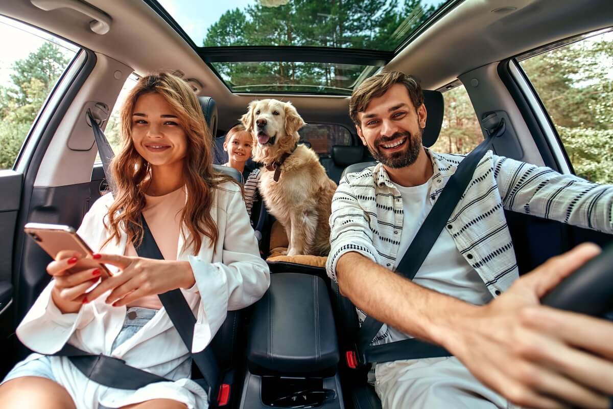 Family taking a summer trip in their car
