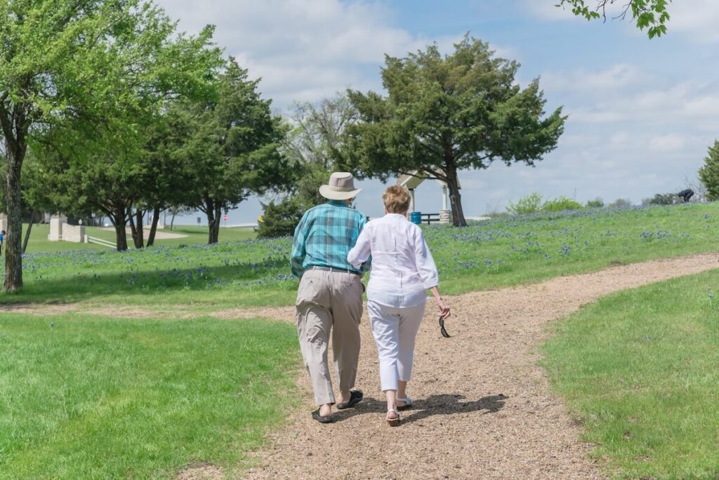 A senior couple walking together