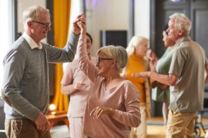 Older adults dancing together