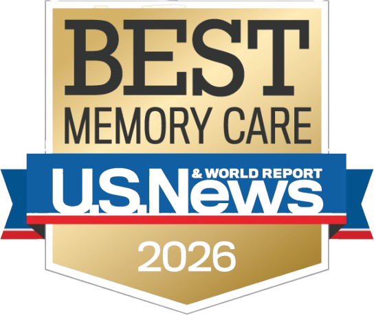 Gold shield badge reading 'BEST MEMORY CARE' atop, blue 'U.S. News & World Report' ribbon, and '2026' at the bottom.
