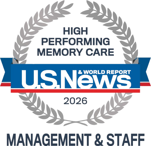 US News & World Report 2026 High-Performing Memory Care award badge with laurel wreath and blue ribbon for Management & Staff.
